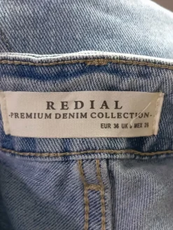 Jeansschlaghose                            Größe                36