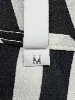 Schlupf-Bluse                            Größe                38