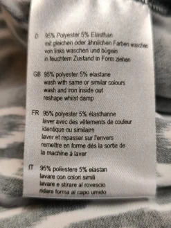 Schlupf-Bluse                            Größe                48